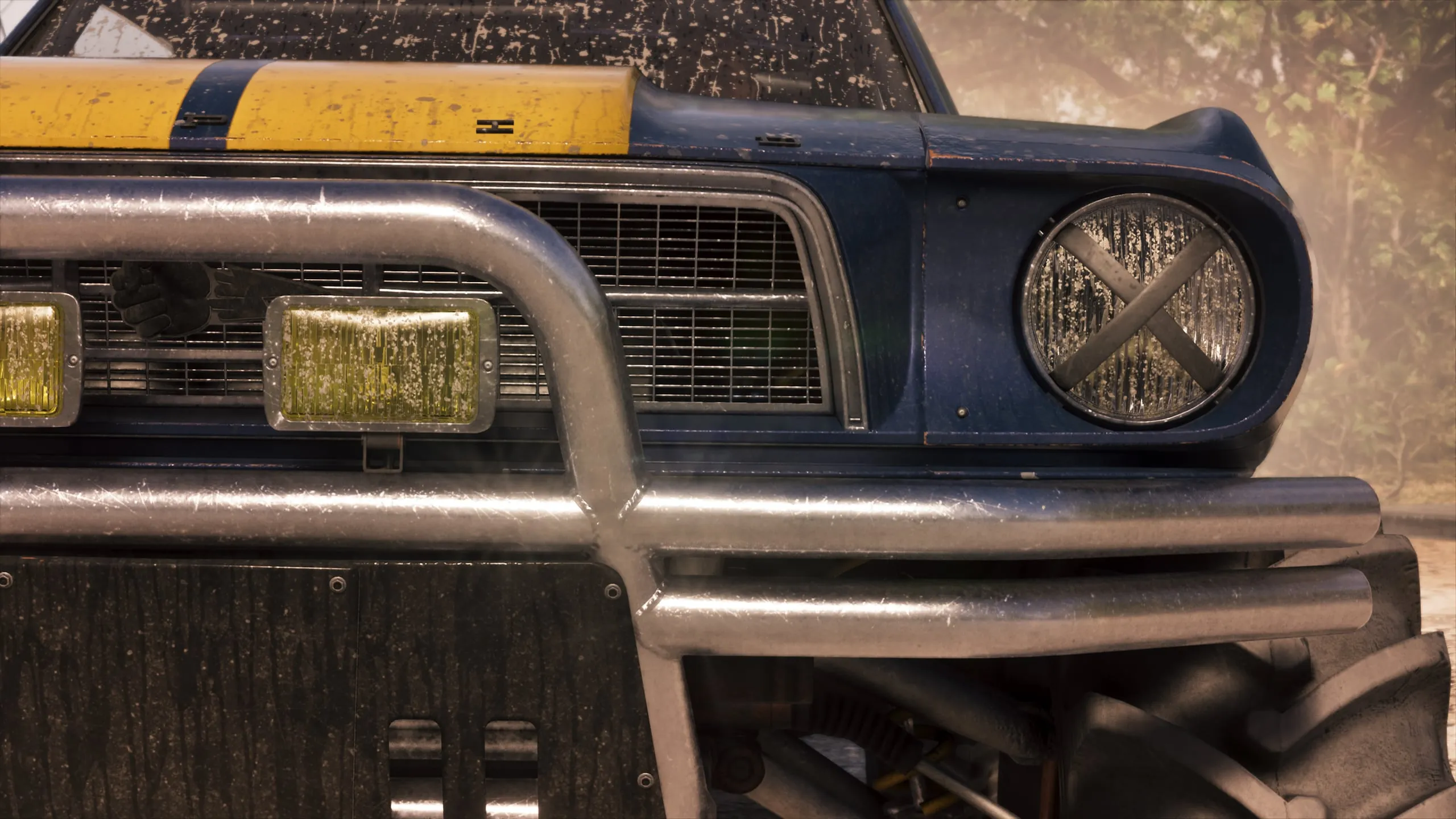 A blue Vapid Dominator buggy with a bull bar and a taped-up headlight