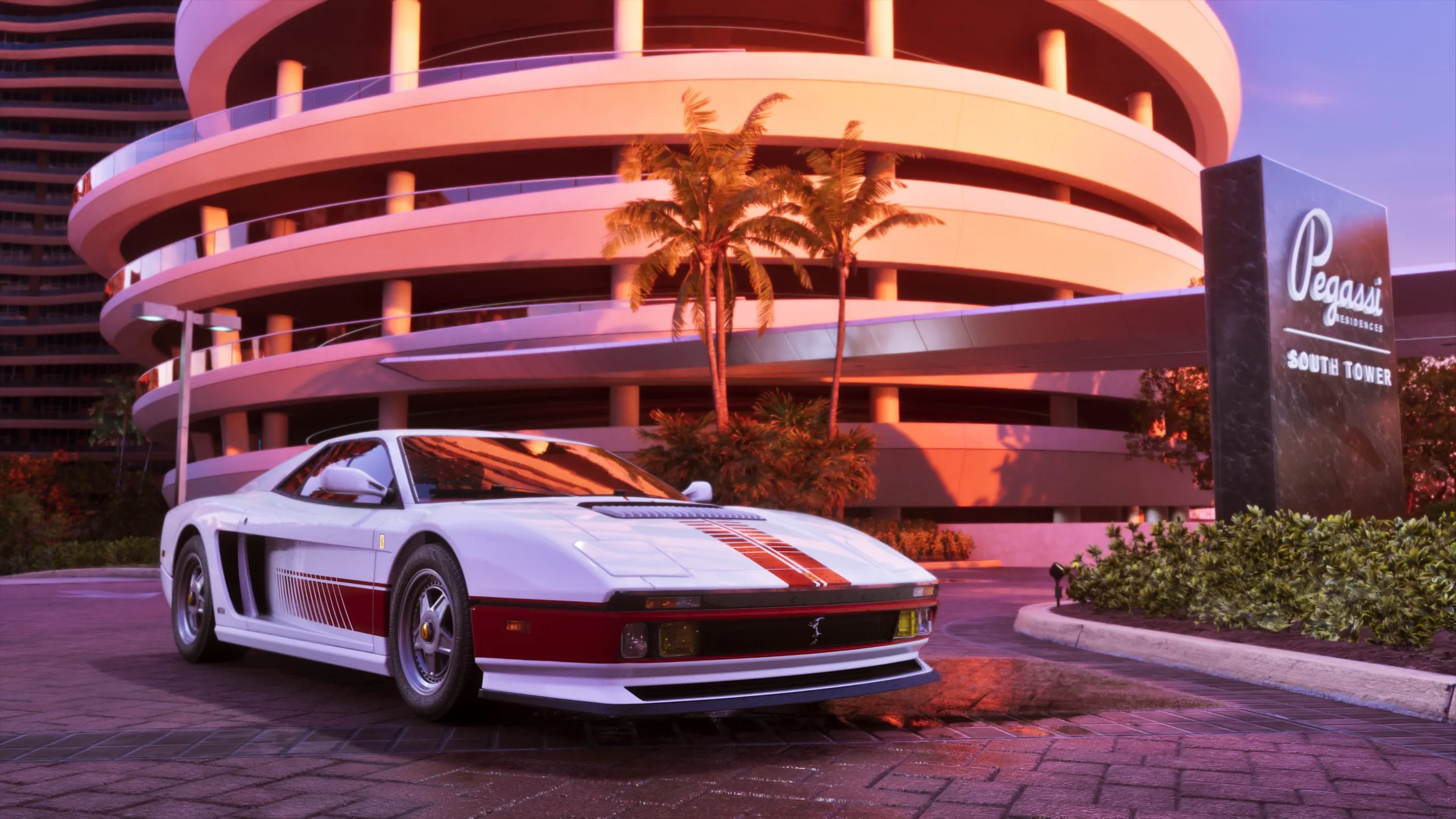 A white 1995 Grotti Cheetah by the Pegassi Residences spiral garage