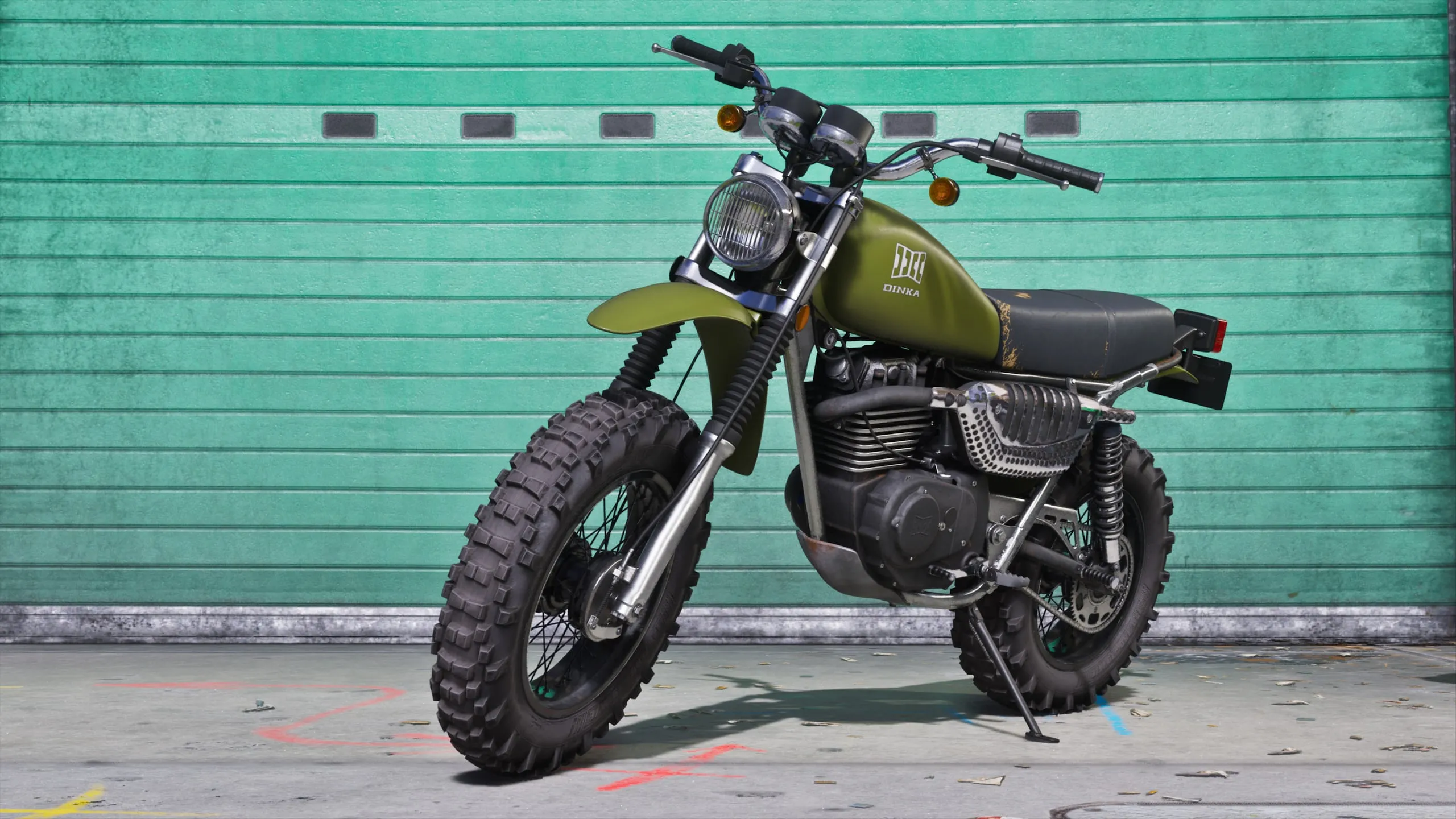 The olive Dinka Enduro motorcycle by a garage door