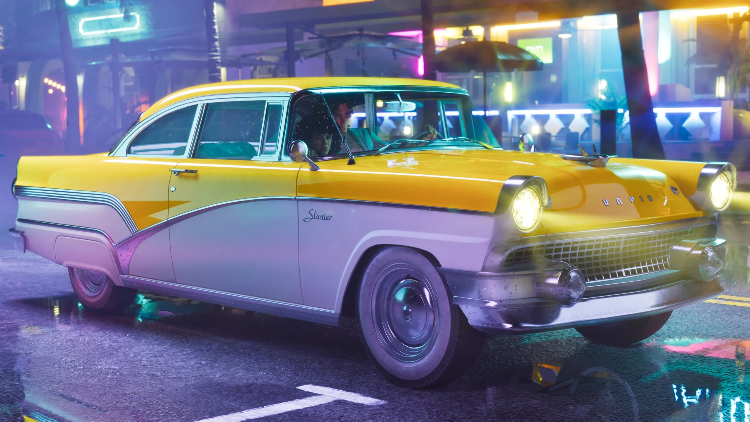 A yellow-and-white 1955 Vapid Stanier on a neon street at night